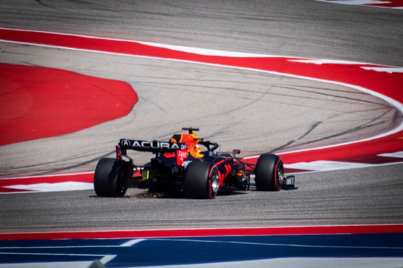 Max Verstappen enters the Circuit of the Americas esses section, his RB15 bottoms out and produces sparks