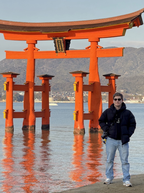 Portrait photo of Antonio Latte in front of Itsukushima Shrine, 2025.